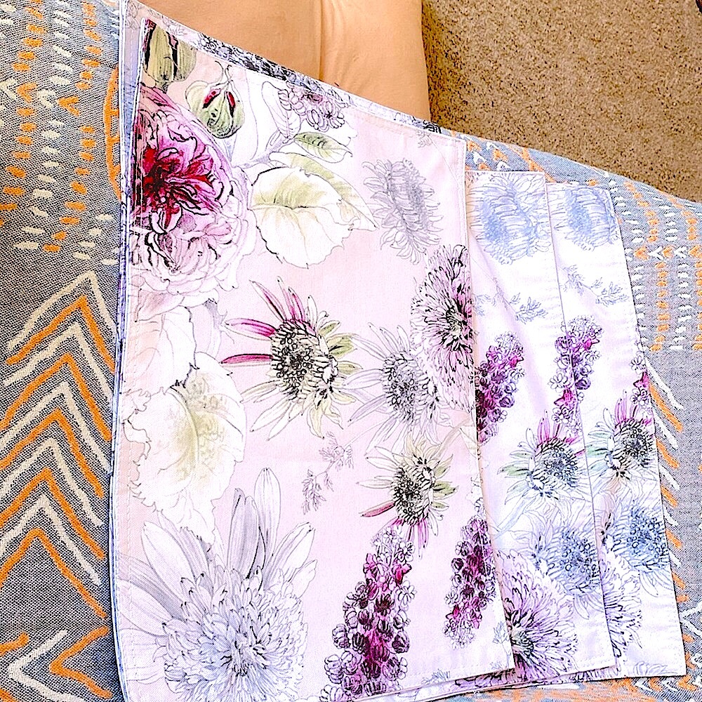 4 cotton placemats, purple, green on light gray background. 2 never used, 2 were